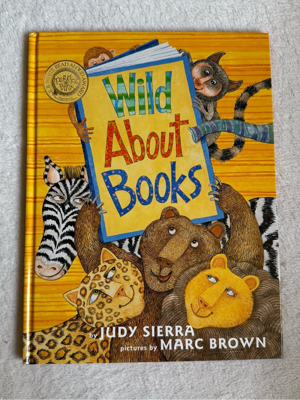 Wild About Books by Judy Sierra - Bright Yellow Hardcover Picture kids Book